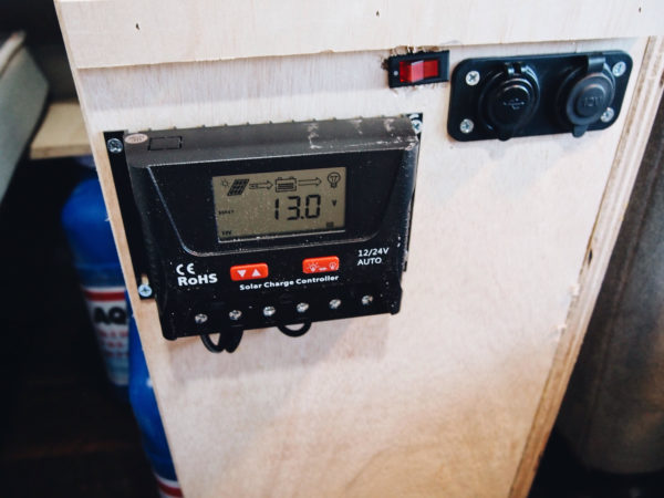 The solar charge controller and 12v outlets