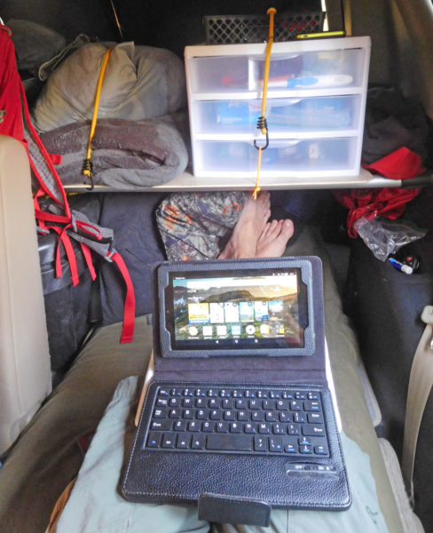 Busting out the tablet inside the SUV