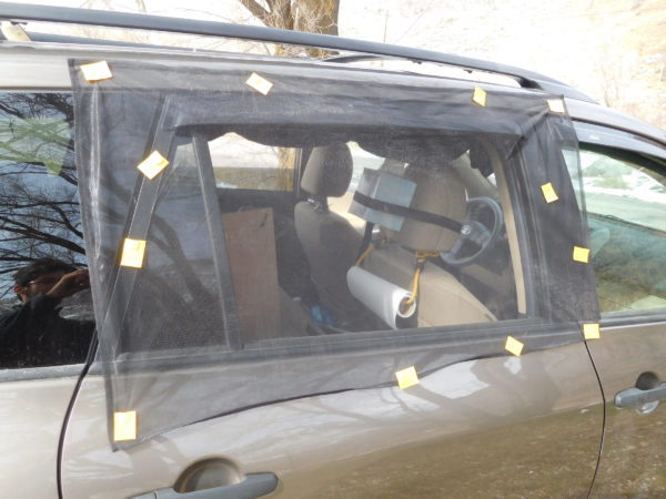 Magnetic car window screen setup