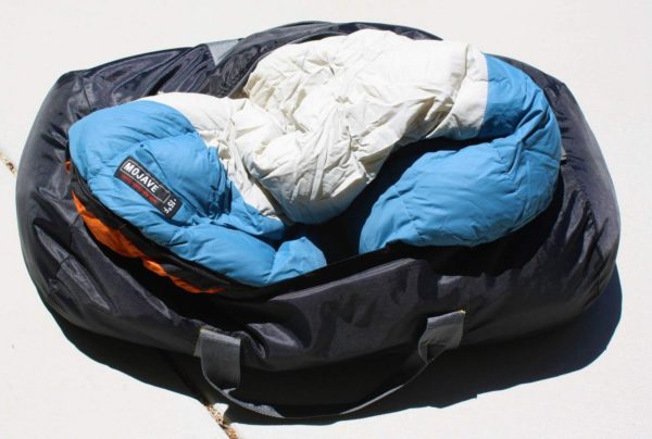 The mummy: store your sleeping bag in a duffel bag. There are actually two sleeping bags in there, which come in handy when fall arrives. I can also pack the extra one in my backpack the day before leaving for a trek, and still have another to sleep in that night near the trailhead.