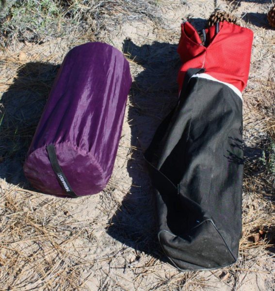 Chairman of the board: the ThermaRest Luxury Map mattress rolls up and slips inside this purple stuff sack. Right: a Coleman folding chair.
