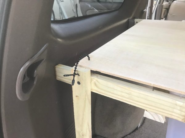 Storage shelf build in the back of a 1998 Toyota 4Runner